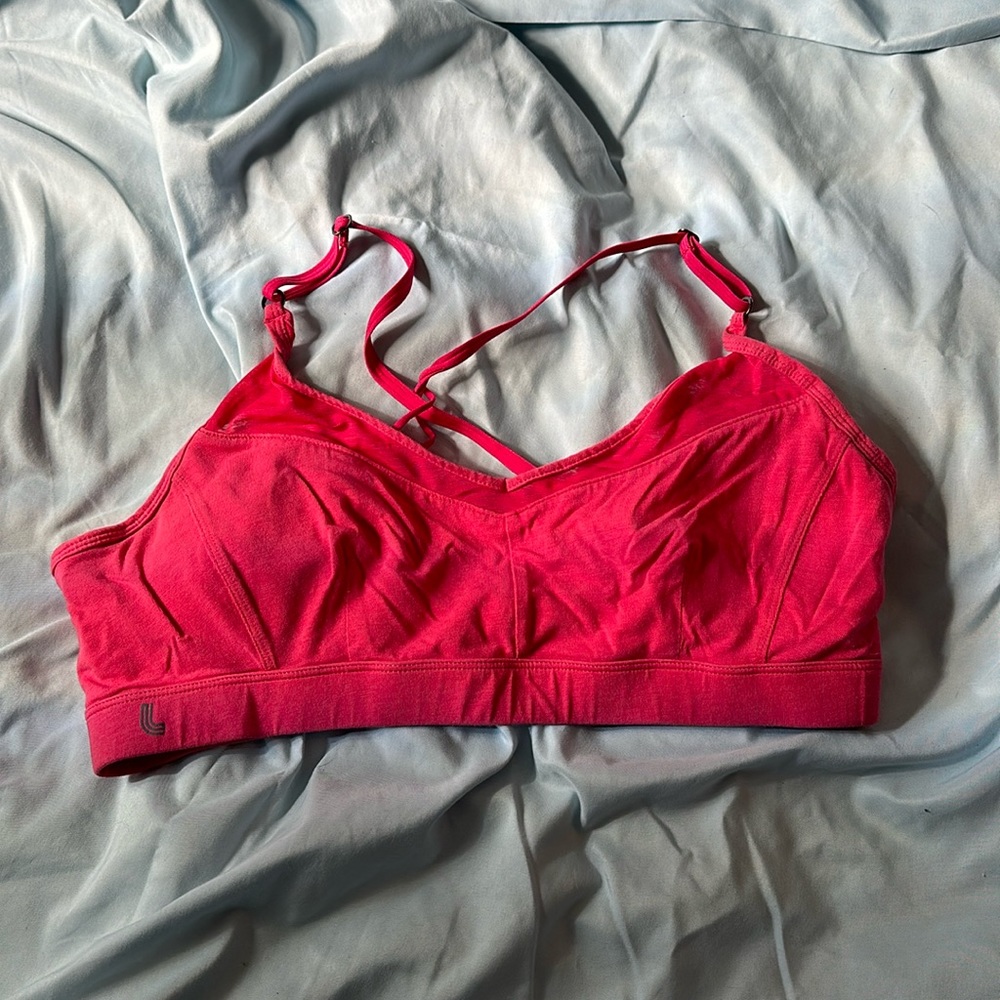 Like pink sports bra with fun strappy back